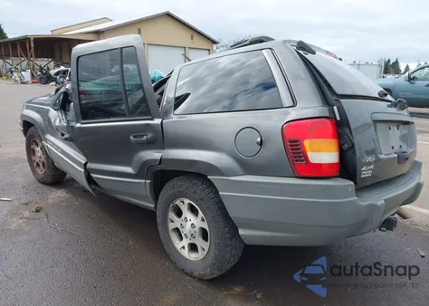 2002 Jeep Grand Cherokee Sport z USA, uszkodzony, nr VIN 1J8GW38S42C279628